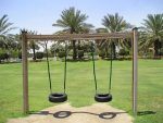 The Double Tyre Swing – wooden children's playground
