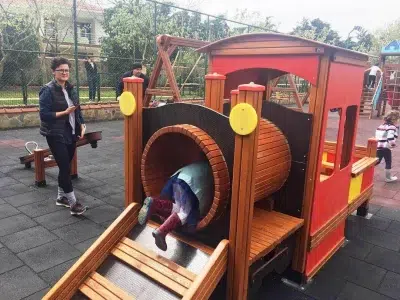 Train-themed wooden playground — Elysee