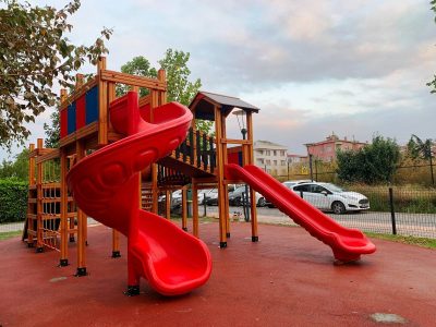 Wooden playground with red slides — Elysee
