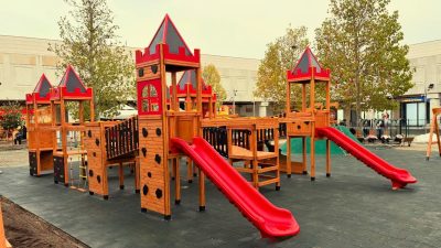Castle-themed wooden playground — Elysee