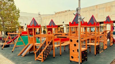 Castle-themed wooden playground — Elysee