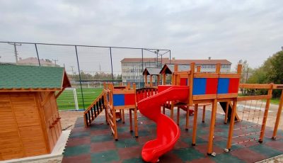 Wooden playground with red slides — Elysee