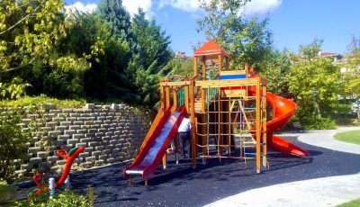 Wooden playground with red slides — Elysee