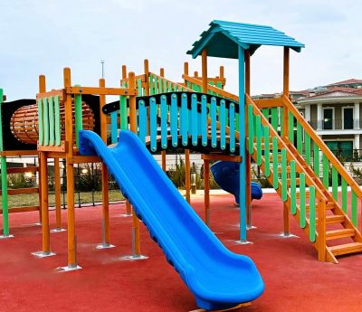 Wooden playground with blue slides — Elysee