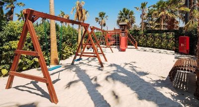 Wooden adventure play area on the beach — Elysee
