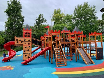 Castle-themed wooden playground — Elysee