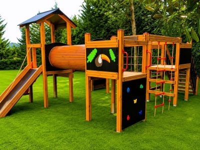 Crawl tunnel in a wooden playground — Elysee
