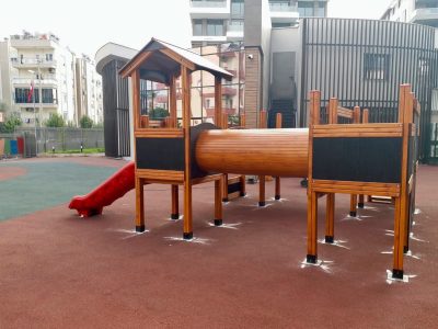 Crawl tunnel in a wooden playground — Elysee